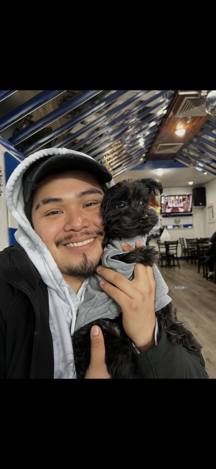 Hugo spending time with his dog Brownie